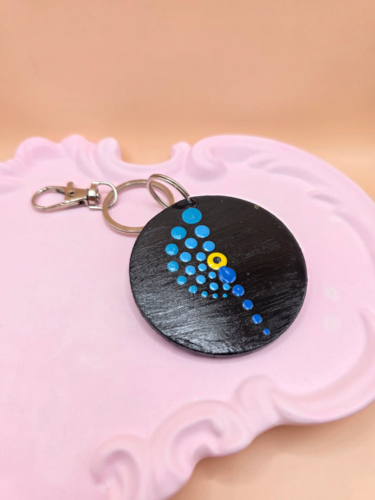 Porte-clé rond en bois motif œil protecteur