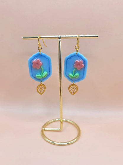 Boucles d’oreilles florales bleues