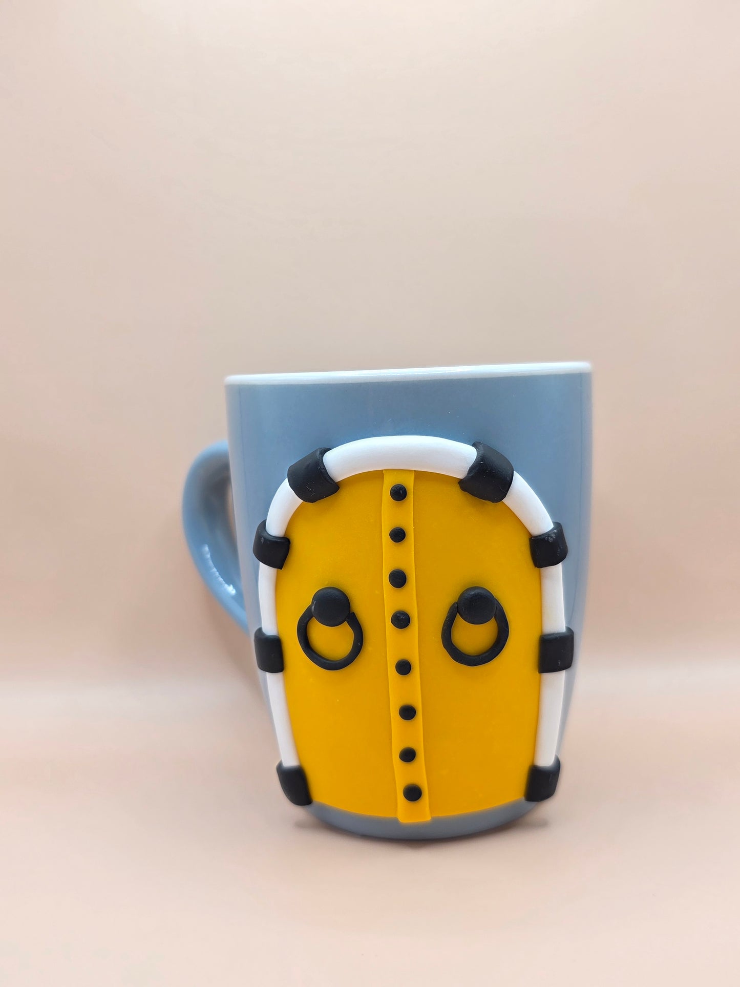 Tasse artisanale porte tunisienne jaune – avec dessous de tasse assorti