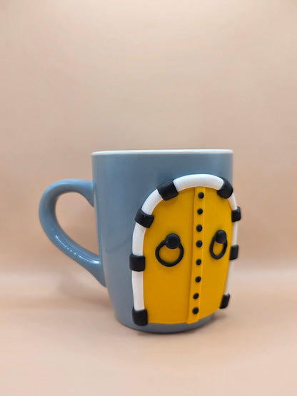 Tasse artisanale porte tunisienne jaune – avec dessous de tasse assorti