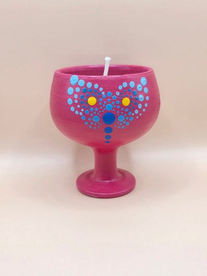 Bougie parfumée fleurie dans coupe décorative