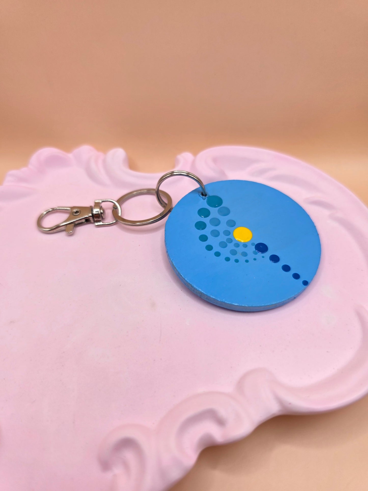 Porte-clé main bleu