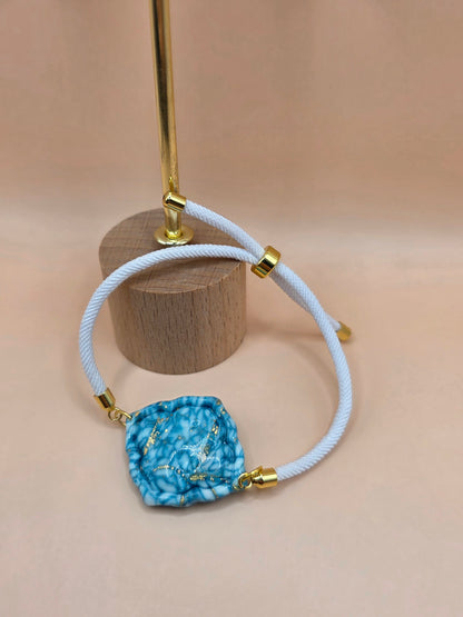 Set bijoux bleu marbré – boucles + bracelet corde