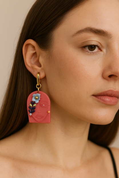Boucles d’oreilles visage fleuri rose